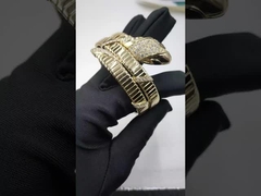 Serpenti deux bobines 18 kt bracelet en or jaune avec demi pavé diamants et yeux en onyx noir