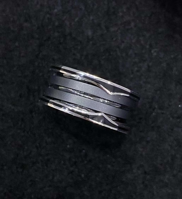 18K Gold Luxury Brand Jewelry Ring With Two 18 Kt White Gold Loops And A Black Ceramic Spiral